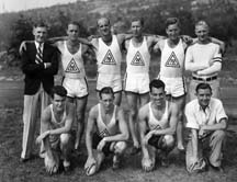 Track & Field Team ca. 1940: (Back, L to R) Jock Lundie, John Haddock, Bert Marion, Gus Lidberg, Doug Disney, Dawson Pirie. (Front) Martin Naylor, Bob Redhead, Vincent Forbes, Jack McGuire. (Photo courtesy Powell River Historical Museum)
